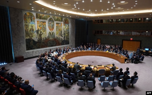 FILE - Members of the United Nations Security Council gather for a meeting on North Korea, Sept. 27, 2018, at the United Nations in New York.