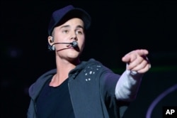 Recording artist Justin Bieber performs at the 2015 Billboard Hot 100 Music Festival at Nikon at Jones Beach Theater in Wantagh, NY.