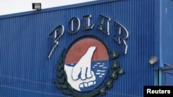 FILE - The corporate logo of Empresas Polar is seen at a facility of the company in Caracas July 30, 2015. 