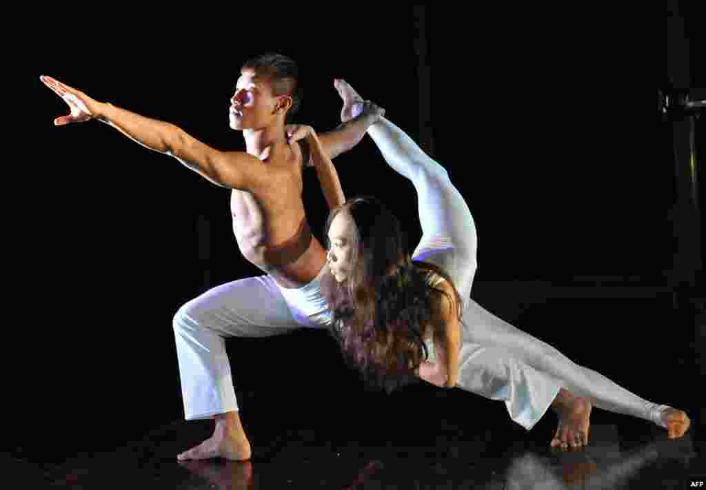 Taiwanese dancers perform during a press conference for the Tsai Jui-Yueh Dance Festival VIII Morning Without Sunrise in Taipei. 