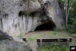 The June 27, 2017 photo shows the entrance at the 'Sirgenstein' cave in Blaubeuren, Germany. Art dating to the Ice Age was found in the caves.