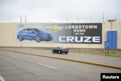A car passes by the General Motors Lordstown Complex, assembly plant in Warren, Ohio, Nov. 26, 2018.