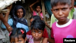 Rohingya Muslims are seen in Bawdupa IDP camp outside of Sittwe, Burma, Aug. 11, 2013. 