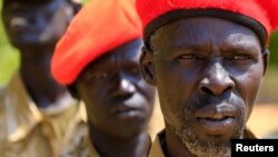 South Sudanese soldiers listen during a briefing at the army general headquarters in Juba, Jan. 8, 2014. 