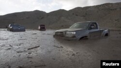 A mudslide Thursday left nearly 200 vehicles, including 75 semitrailer trucks, stuck in up to five feet of mud and debris on State Route 58 near Tehachapi, California, local police said, Oct. 17, 2015. 