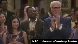 Actor Bambadjan Bamba is seen alongside Ted Danson in this NBC publicity photo for the TV Show "The Good Place."