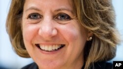 Lisa Monaco, assistant to the US president for homeland security and counterterrorism smiles as she talks with journalists at the US - European Media Hub in Brussels on May 10, 2016. 