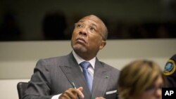 FILE - Former Liberian President Charles Taylor looks up as he waits for the start of his sentencing hearing in Leidschendam, near The Hague, Netherlands, May 16, 2012.