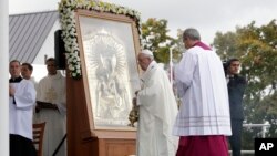 Pope Francis celebrates Mass in the area of the Shrine of the Mother of God, in Aglona, Latvia, Sept. 24, 2018. 