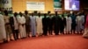 Photo de famille des ministres avec le vice-président nigérian à la conférence de la Communauté économique des Etats d'Afrique de l'Ouest (Cédéao) à Abuja, Nigeria, 26 avril 2018. (VOA/Gilbert Tamba)