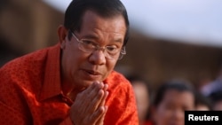 Cambodia's Prime Minister Hun Sen attends a ceremony at the Angkor Wat temple to pray for peace and stability in Cambodia, Dec. 3, 2017.