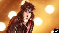 FILE - In this April 28, 2015 file photo, Nikki Sixx of Motley Crue performs in concert with the band Sixx:A.M. at The Electric Factory in Philadelphia.