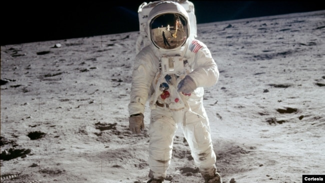 : Astronaut Buzz Aldrin walks on the surface of the moon near the leg of the lunar module Eagle during the Apollo 11 extravehicular activity (EVA).