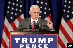 Republican vice presidential candidate Gov. Mike Pence, R-Ind., addresses supporters during a campaign event in Novi, Mich., July 28, 2016.