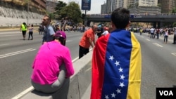 Les Vénézuéliens manifestant dans les rues de Caracas, le 1er mai 2019.