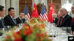 President Donald Trump and China's President Xi Jinping lead their respective delegatiosn during their bilateral meeting at the G-20 Summit, Dec. 1, 2018, in Buenos Aires, Argentina.