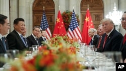 President Donald Trump and China's President Xi Jinping lead their respective delegations during their bilateral meeting at the G-20 Summit, Dec. 1, 2018, in Buenos Aires, Argentina.