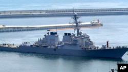 FILE - The USS Curtis Wilbur, a 8,950-ton Aegis destroyer of the U.S. Navy, arrives at a naval base in Busan, South Korea, June 4, 2010. 