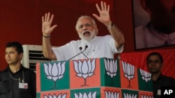 FILE - Indian Prime Minister Narendra Modi is seen speaking at an election rally of the ruling Bharatiya Janata Party (BJP), in Kolkata, India, April 17, 2016.