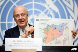 FILE - U.N. Special Envoy for Syria Staffan de Mistura gives a press conference closing a round of Syria peace talks at the European headquarters of the United Nations offices in Geneva, Dec. 14, 2017.