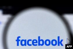 Facebook logo is pictured on a laptop screen in Moscow on August 26, 2021. (AFP)
