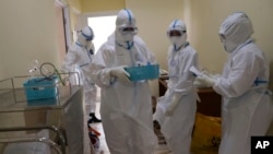 Virus Outbreak Indonesia Doctors