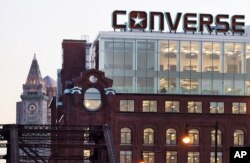 The Converse logo is displayed on the roof of the company's world headquarters in the West End neighborhood of Boston, Dec. 28, 2016.