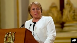 FILE - Chilean President Michelle Bachelet is trying to cope with a series of natural disasters that have plagued her nation. "It doesn't help anyone for me to get frustrated," she said in an interview.