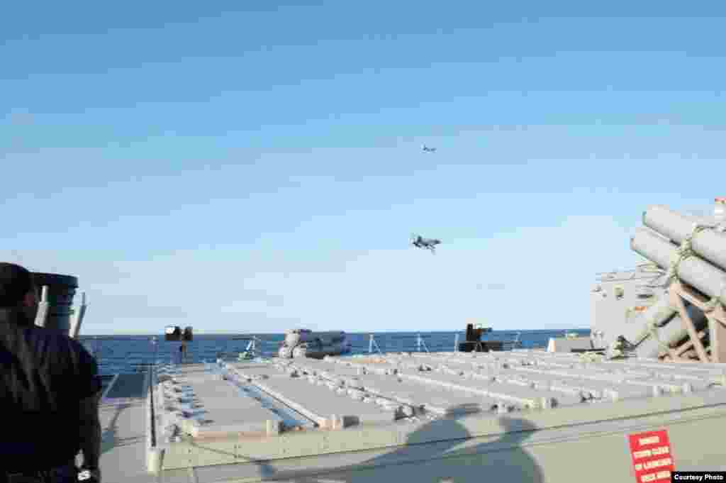 Image of Russian fly-over near guided-missile destroyer USS Donald Cook in Baltic Sea as provided by the U.S. Navy 6th Fleet.