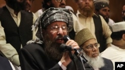 Maulana Sami-ul-Haq ,a Pakistani religious cleric and member of Taliban's negotiating team, speaks during a press conference in Lahore, Pakistan, Feb. 15, 2014.