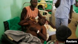 Un rebelle du Mouvement populaire de libération du Soudan (SPLA-N) blessé couché sur un lit d’hôpital dans le village de Gidel, Sud Kordofan ,30 avril 2012. 