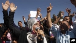 Yemeni students chant slogans calling on their president Ali Abdullah Saleh to leave the government and follow Tunisian ousted President Zine El Abidine Ben Ali into exile during a protest in Sanaa, Yemen, 22 Jan 2011