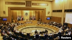Foreign ministers of the Arab League take part in an emergency meeting at the group's headquarters in Cairo September 7, 2014.