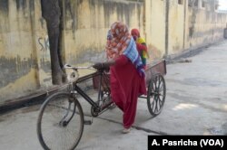 Many women in Alipur village in Haryana state keep their head covered, as tradition demands.