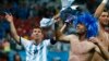 Argentina's Lionel Messi (L) and his teammate Pablo Zabaleta celebrate winning their 2014 World Cup semi-finals against the Netherlands in Sao Paulo July 9, 2014.