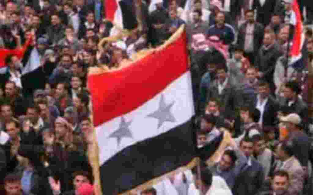 A still image taken from amateur video purportedly shows anti-government demonstrators rallying in Jasim, Deraa Governorate, April 22, 2011