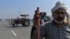 بھارتی حکومت کی زرعی پالیسوں کے خلاف احتجاج کرنے والے کسان (فوٹو، پرکاش سنگھ، اے ایف پی)