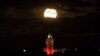 The supermoon is seen over the historical Galata Tower in Istanbul, Turkey, early November 14, 2016. 