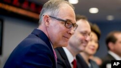 EPA Administrator Scott Pruitt, left, attends a briefing on this year's hurricane season at the Federal Emergency Management Agency Headquarters, June 6, 2018, in Washington.