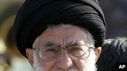 Iran's Supreme Leader Ayatollah Ali Khamenei looks on as he attends the Iranian army land force academy graduating ceremony in Tehran, November 10, 2011.