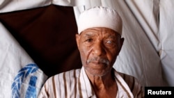 Displaced Libyans from the city of Tawergha live in prefabricated houses for workers at a construction site on the outskirts of Benghazi July 9, 2012.