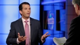 Donald Trump Jr., left, is interviewed by host Sean Hannity on his Fox News Channel television program, in New York, July 11, 2017.