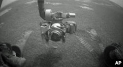 NASA's Opportunity rover used its front hazard-identification camera to obtain this image at the end of a drive on the rover's 1,271st sol, or Martian day (Aug. 21, 2007).