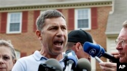 Ruslan Tsarni, the uncle of the Boston Marathon bombing suspects, speaks with the media outside his Maryland home.