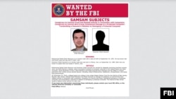 FILE - Mohammad Mehdi Shah Mansouri and Faramarz Shahi Savandi are wanted for allegedly launching SamSam ransomware, which encrypted hundreds of computer networks in the United States and other countries.