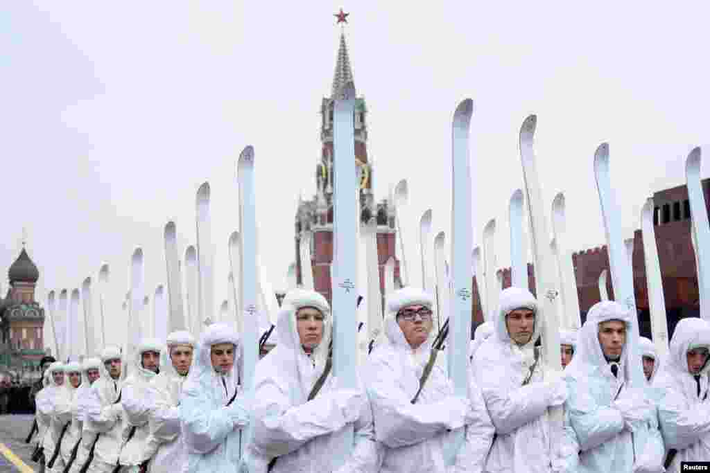 Russian servicemen dressed in historical uniforms rehearse for a forthcoming parade on Red Square in Moscow.