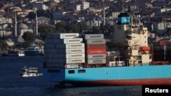 FILE - The Maersk Line container ship Maersk Batam sails in the Bosphorus, on its way to the Mediterranean Sea, in Istanbul, Aug. 10, 2018.