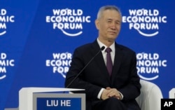 Liu He, member of the Political Bureau of CPC Central Committee, listens during the annual meeting of the World Economic Forum in Davos, Switzerland, Wednesday, Jan. 24, 2018. (AP Photo/Markus Schreiber)