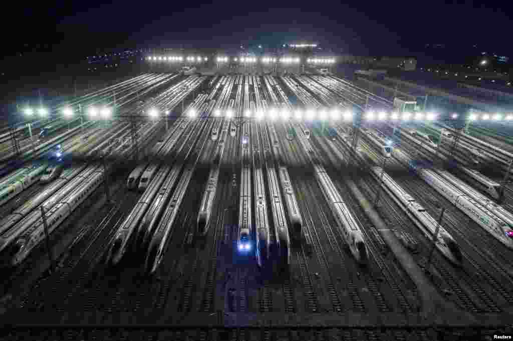 Bullet trains are seen at a high-speed train maintenance base before the Spring Festival travel rush kicks off ahead of the Chinese Lunar New Year, Guangzhou, Guangdong province, China.