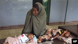 Malnourished children from southern Somalia on a bed at Bandar hospital in Mogadishu, Somalia, August 1, 2011